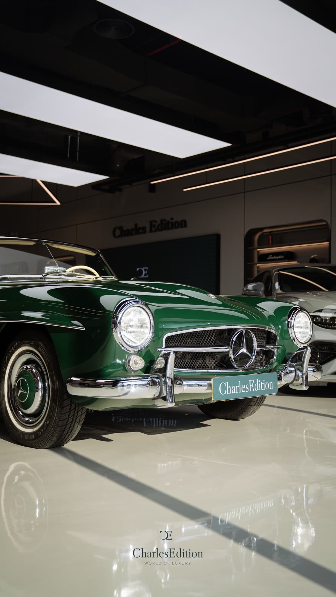 Classic green Mercedes-Benz 300 SL in a garage
