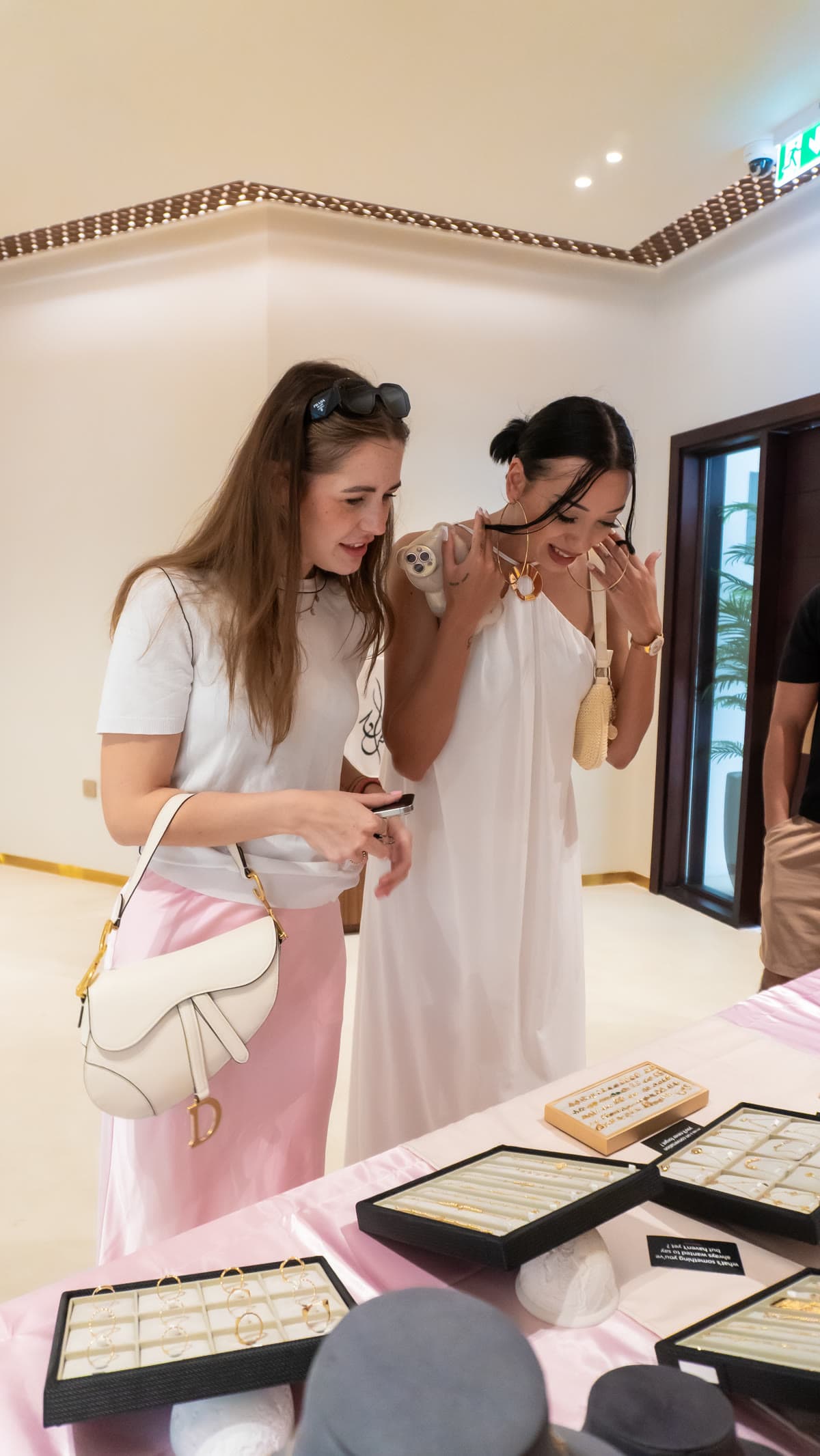 Candid moment between guests at an event
