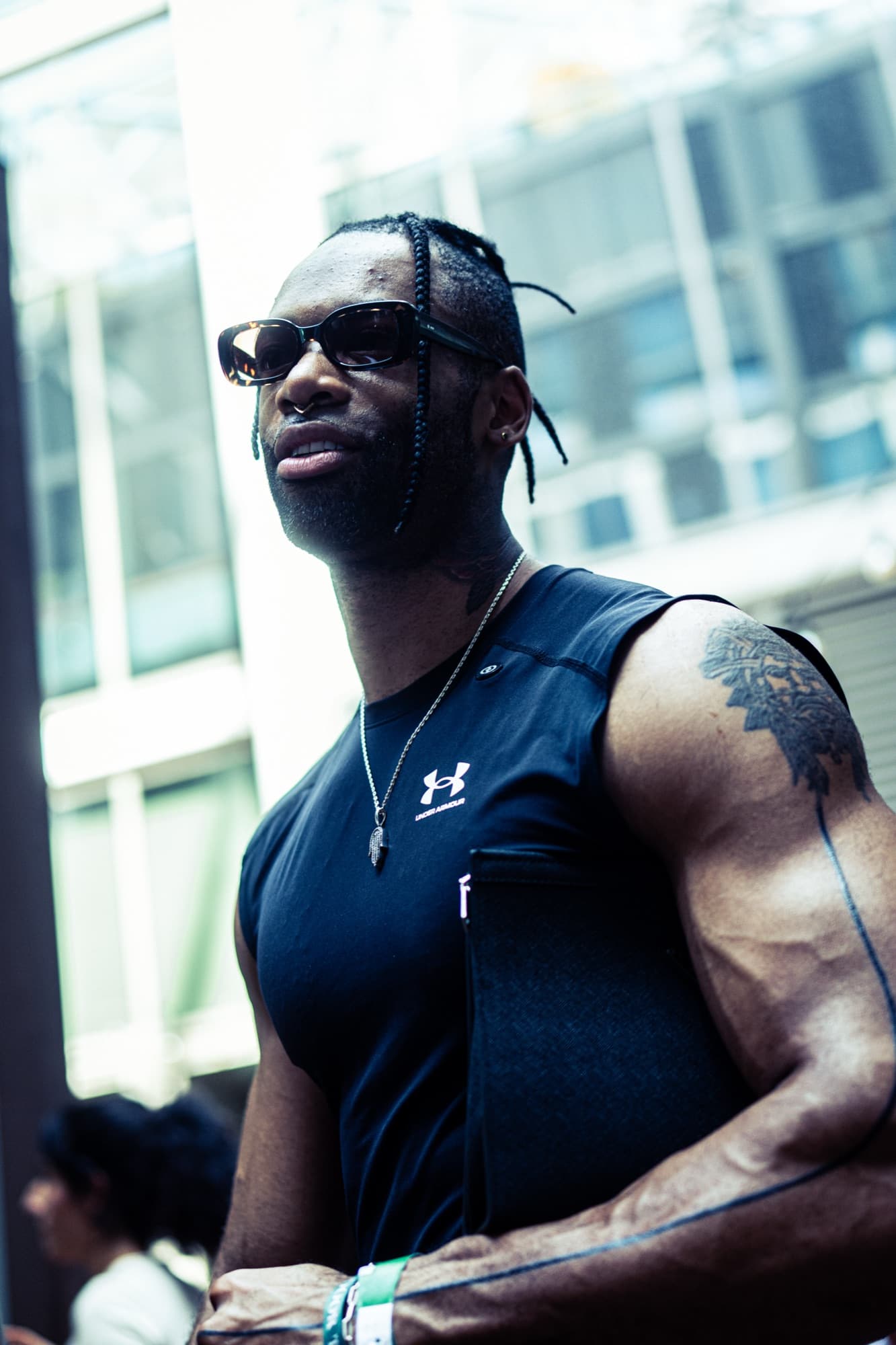 Athlete in sunglasses at an outdoor Clubhouse event