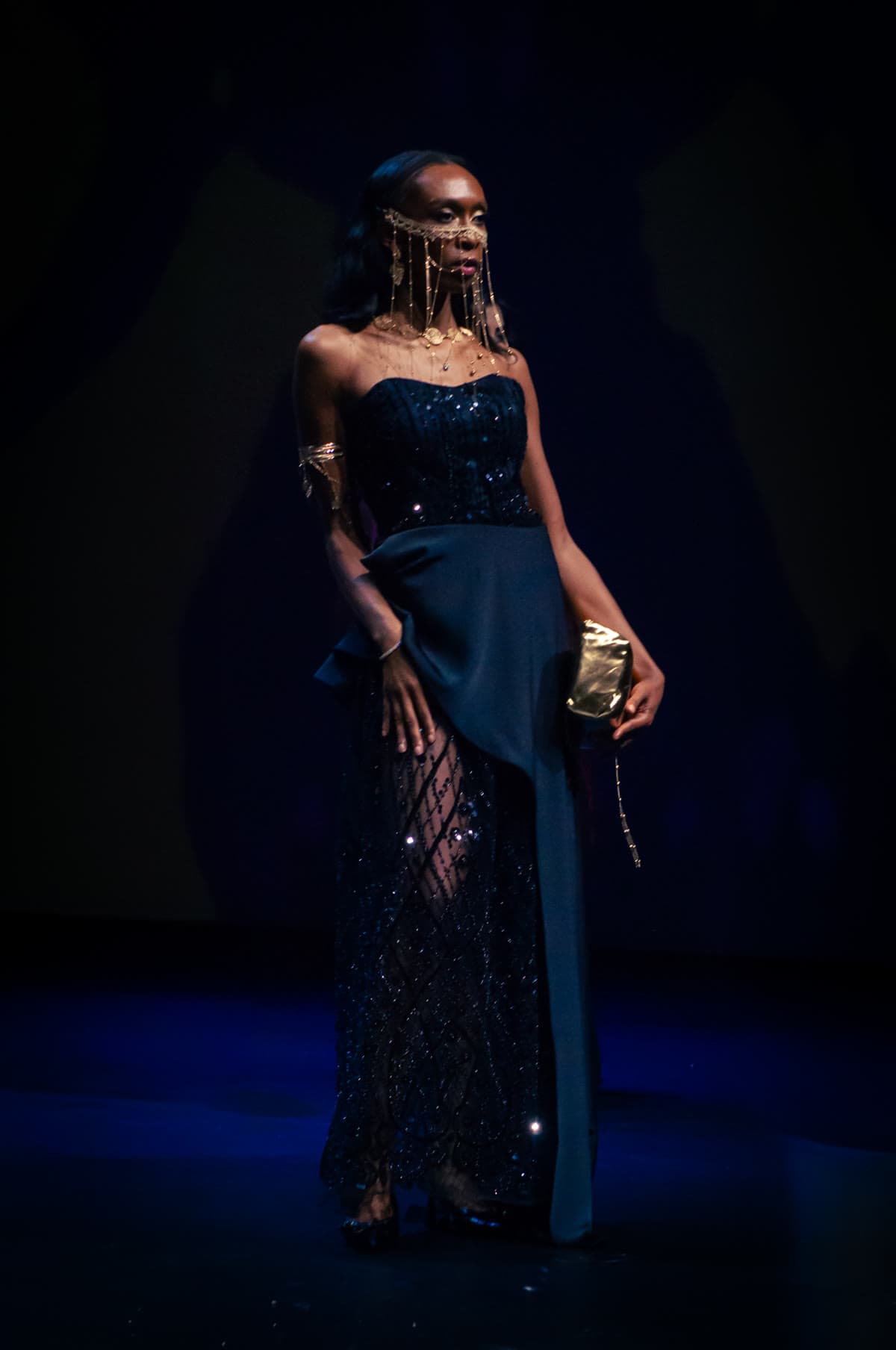 Model in couture on the catwalk