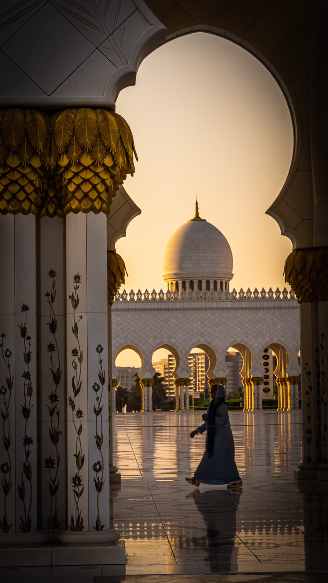 Arches of the Sheikh Zayed Grand Mosque at dusk