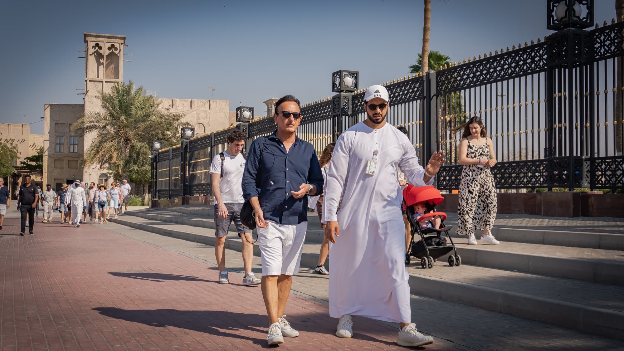 Visitors on the creekside promenade