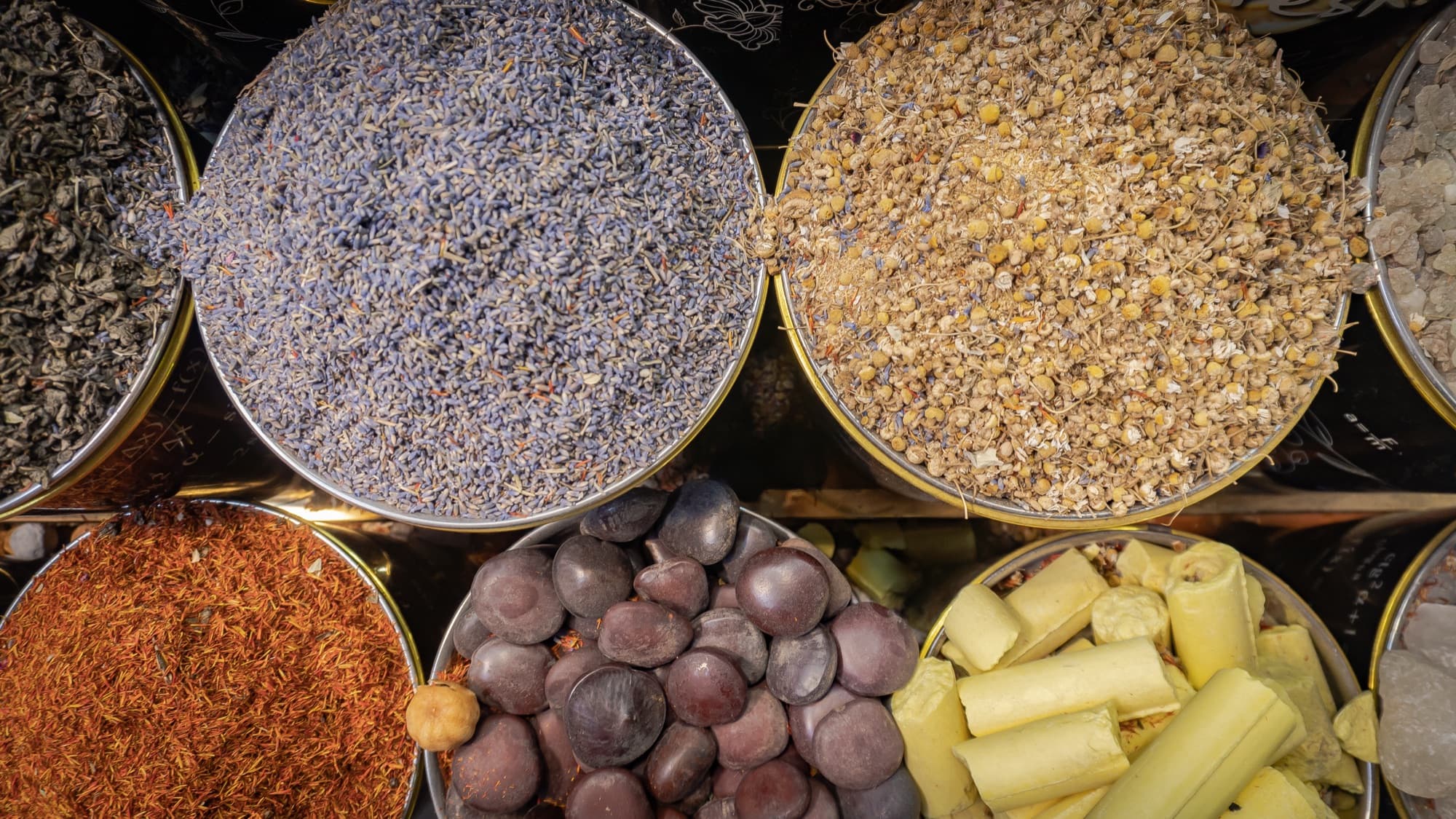 Spices in open bowls at the market